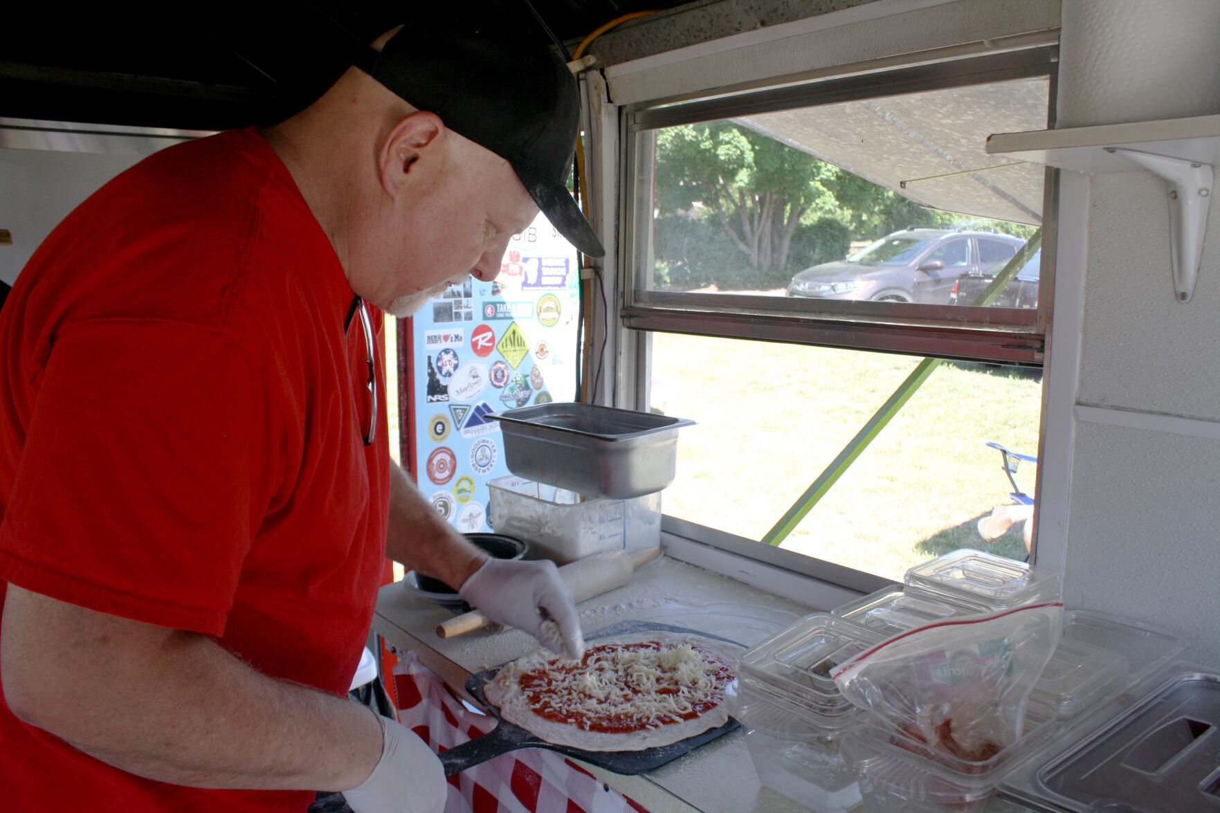 David Penzo making pizza